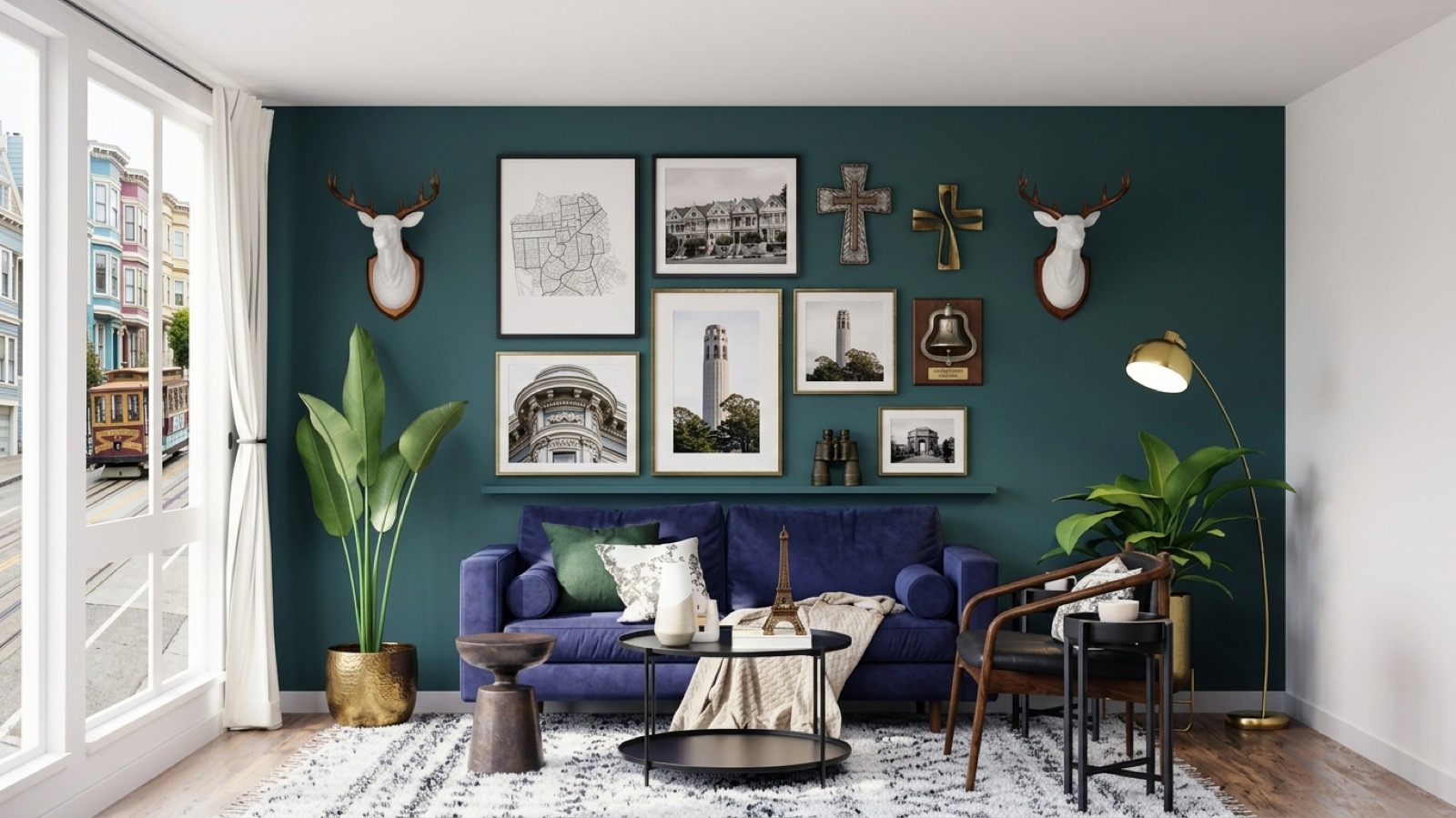 Sitting room with deep teal gallery wall, blue velvet sofa, and cable car view